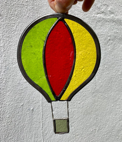 Green, red and yellow stained glass hot air balloon