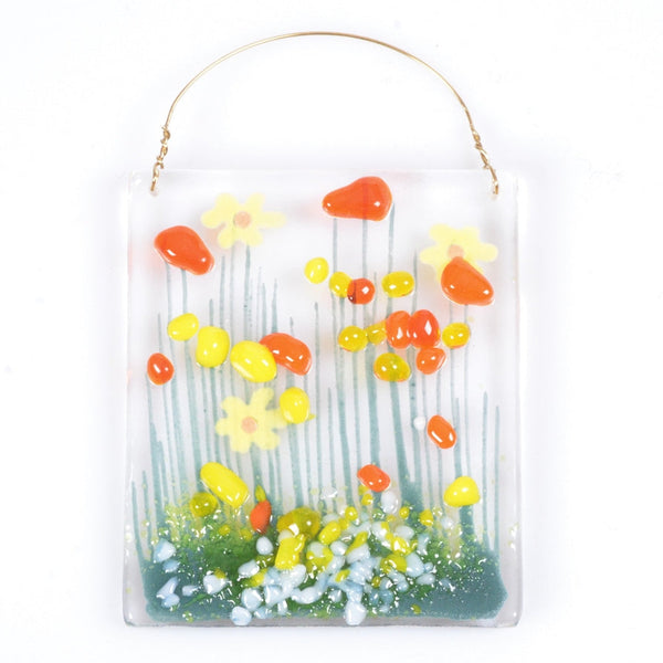 Decorative glass panel with colorful floral design on a white background