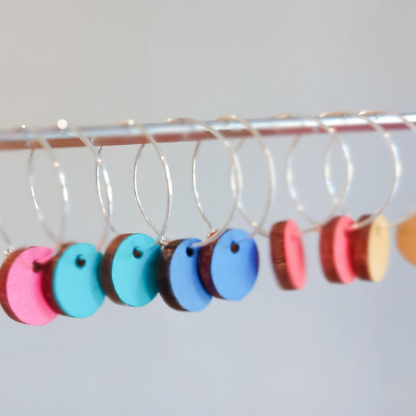 Small hoop earrings with colourful wooden charm