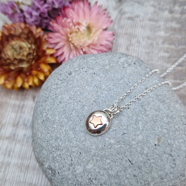 Sterling Silver Pebble Pendant with Copper Star