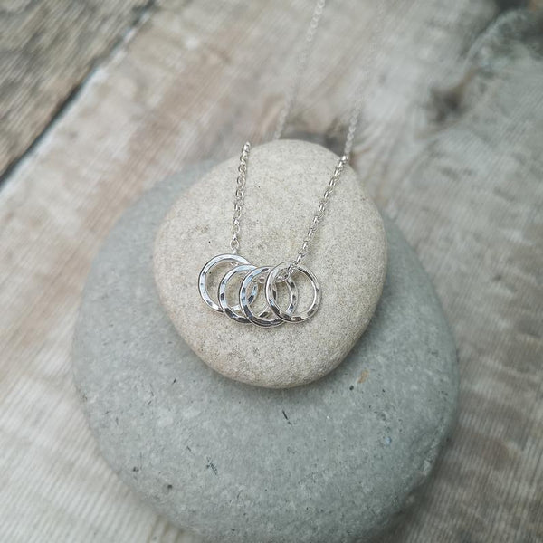 Sterling Silver 4 Hammered Rings Necklace